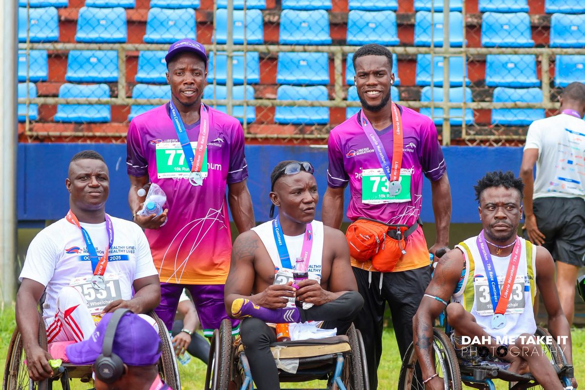 Participants in the 10K Wheelchair Race having a post race drink with ArcelorMittal Liberia team members.

Photo by Dah Me Take It Photography