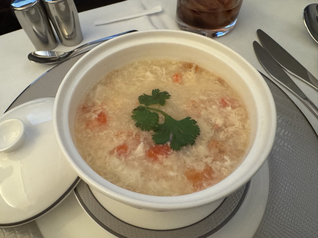 Singapore Airlines never disappoints. Lunch is served, with a fat 30 grams of Oscietra caviar, egg drop soup, lobster en papillote, chicken satay, and a lovely chocolate cake for dessert. Now, time for a little work as we see where radical self care weekend carries me…..