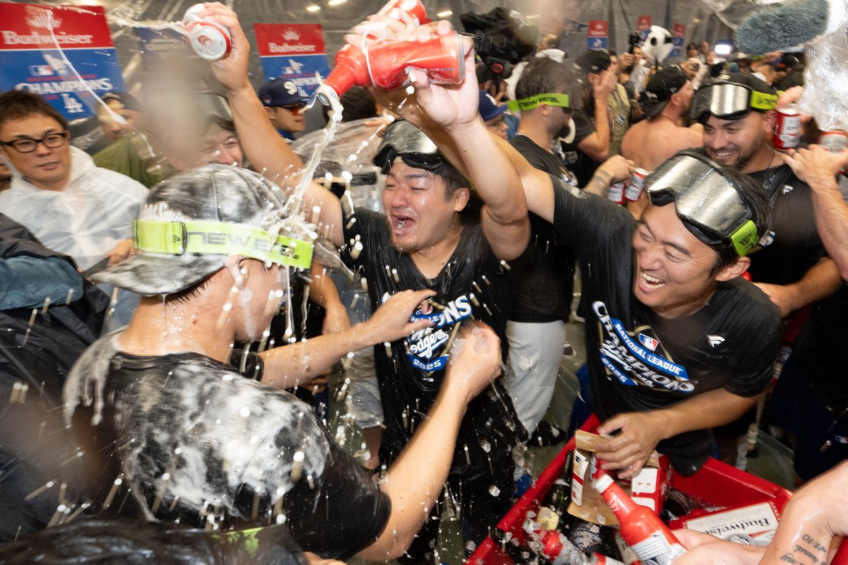 vidcrane's tweet image. Champagne flows as the #Dodgers sweep the #NLCS and head to the #WorldSeries.  #Ohtani hit 3 home runs and struck out 10 batters in a powerful showing.  #MLB