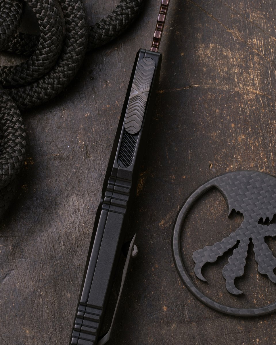 The Combat Troodon® LT – Hellhound: a masterfully crafted knife with blued @bakerforge CopperMai Damascus, hefted alloy DLC hardware, and purple titanium accents.

Experience it today at our showroom: 321 Fanning Fields Road, 12PM–6PM.

#MicrotechShowroom #MicrotechKnives