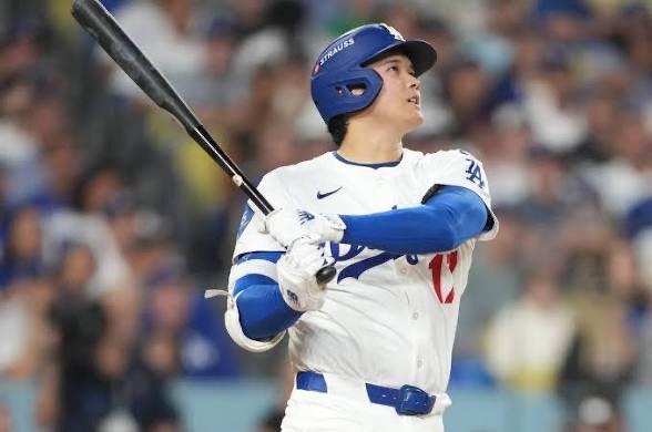 AndrewSurmani's tweet photo. Shohei Ohtani, come on Man! Who does this? 3 home runs, plus pitching 6 scoreless innings while striking out 10 batters in one game? You are worth every single penny of the $700 million over 10 years contract the @Dodgers paid to sign you! #dodgers #ShoheiOhatni #NLCS https://t.co/u120djwPOW