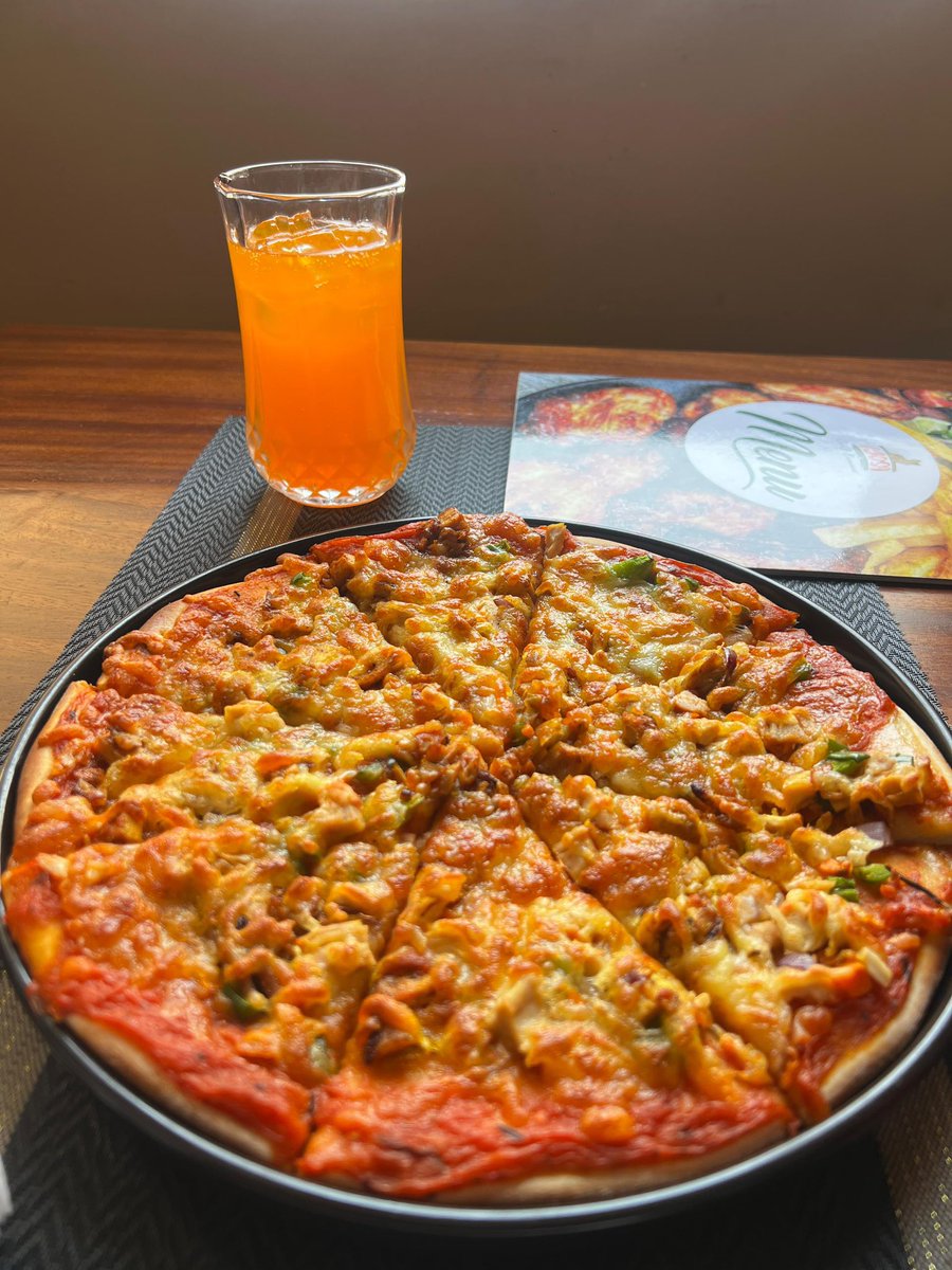 When the food looks this good, you know it’s a great day😋😋😋Seriously can't decide if I want the spicy pizza, the wings, or the amazing platter with matooke and soup.
#IYOSACafeAndRestaurant