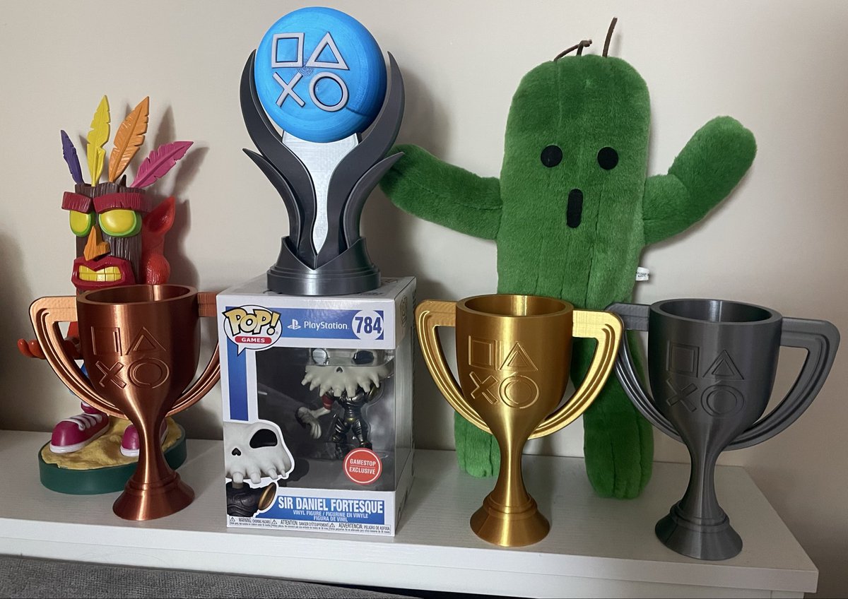 Cactuar is loving these real life trophies and sir Daniel Fortesque is for scale and that it’s spooky season ☠️🌵🏆

#platiumtrophy #sony #PlayStation #ps #trophyhunter #crashbandicoot #finalfantasy #cactuar #PS5 #sirdanielfortesque