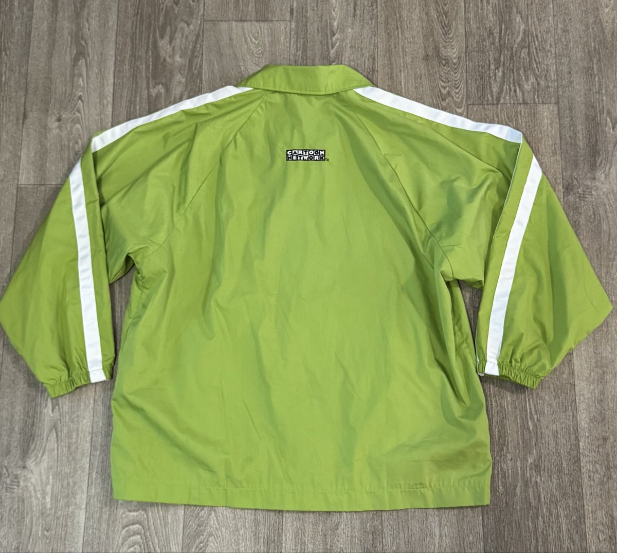 SurberAllison's tweet photo. I’m trying to find out more about this @cartoonnetwork jacket. Not a costume, and doesn’t appear in any online search results. Inner tag looks vintage, jacket is in pristine condition. Is it an employee issued item? https://t.co/EVUhJC0agt