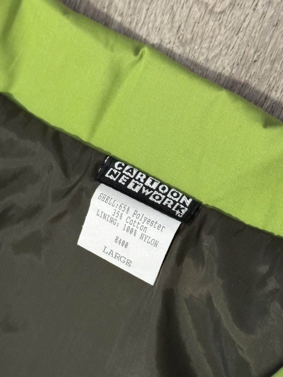 SurberAllison's tweet photo. I’m trying to find out more about this @cartoonnetwork jacket. Not a costume, and doesn’t appear in any online search results. Inner tag looks vintage, jacket is in pristine condition. Is it an employee issued item? https://t.co/EVUhJC0agt