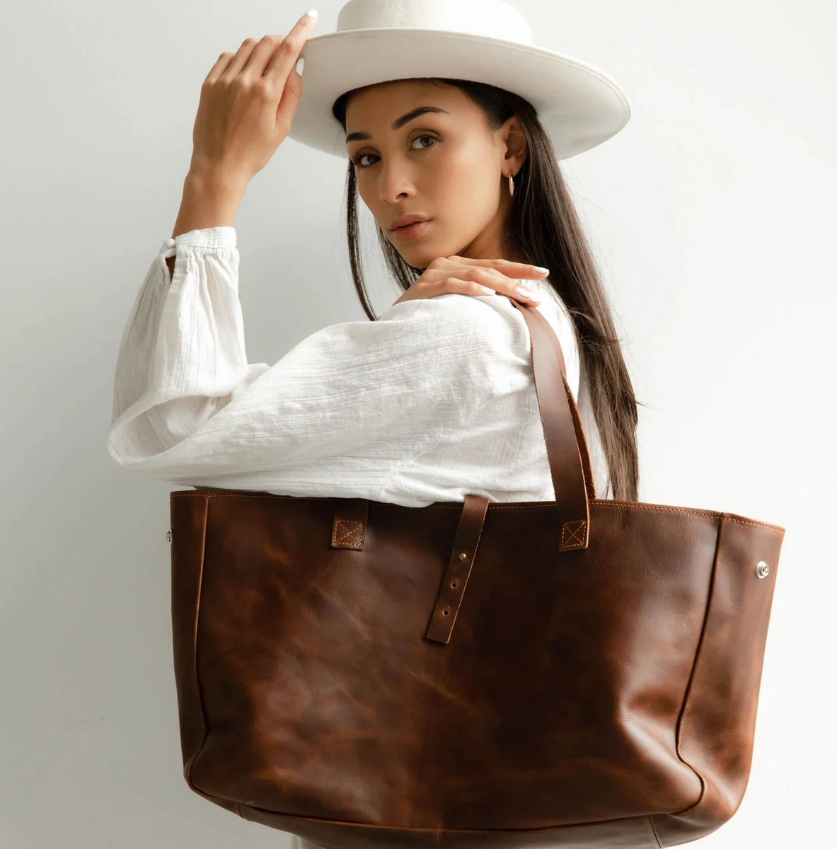 CrissyManwaring's tweet photo. Artisans hand-stitch each piece in this collection with care and precision, turning traditional techniques into pathways for prosperity. Add your logo to elevate it to a statement piece: a tangible nod to your company's commitment to environmental  sustainability and fair trade. https://t.co/k41iiogpt5
