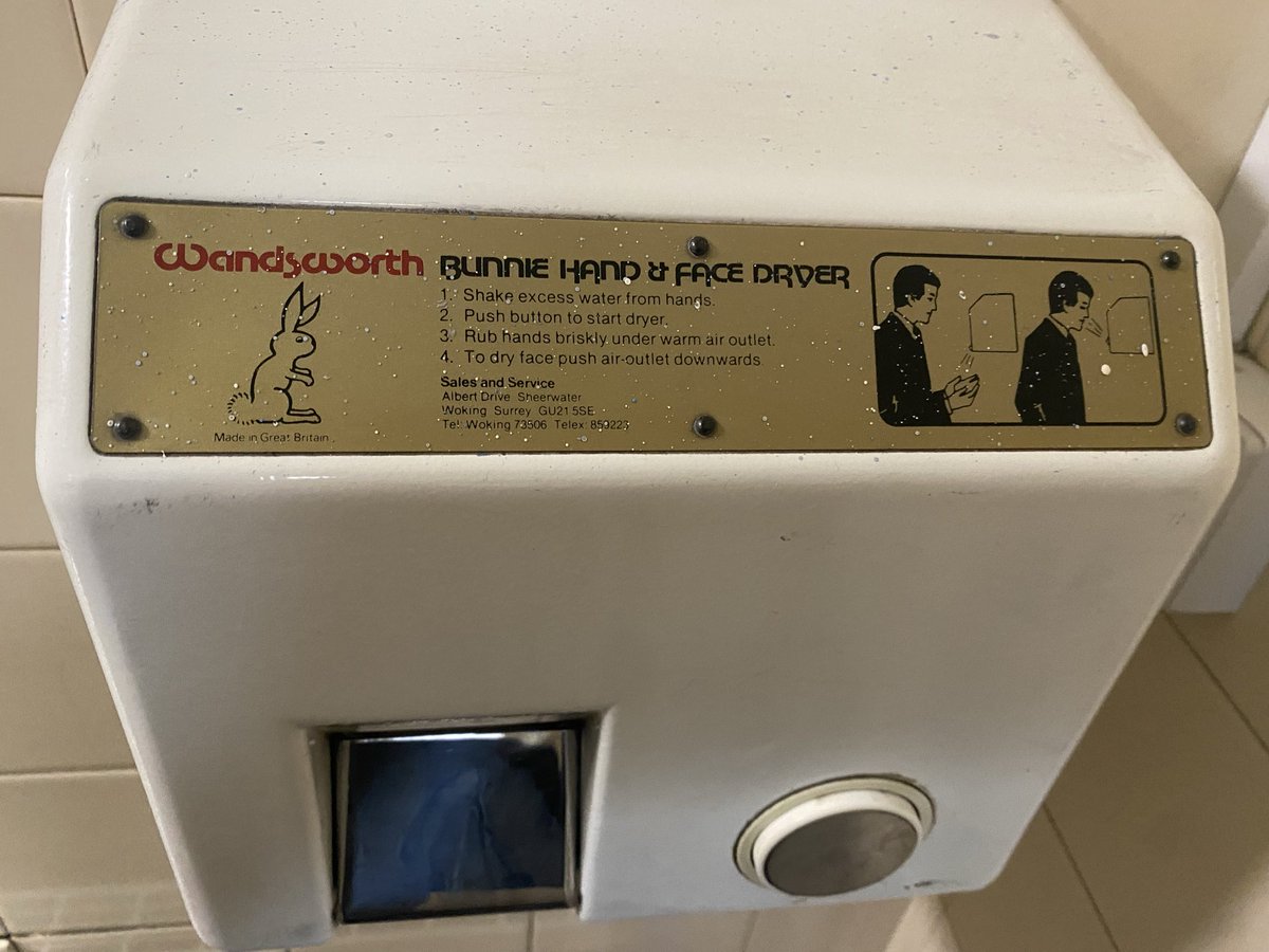 Gents bathroom nostalgia..."Tel: Woking 73506" along with the usage ‘instructions’ kind of dates this hand dryer