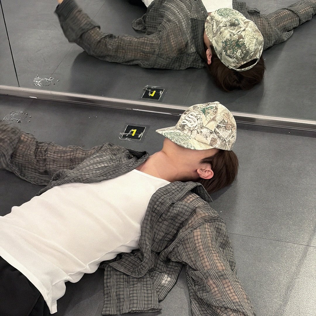 Flat on the floor, but never down for long. The mirror sees exhaustion, but it also reflects defiance. Persistence, showing up again when the world thinks you’re done. Let them think you’ve fallen, but you’re just charging up for the next strike.