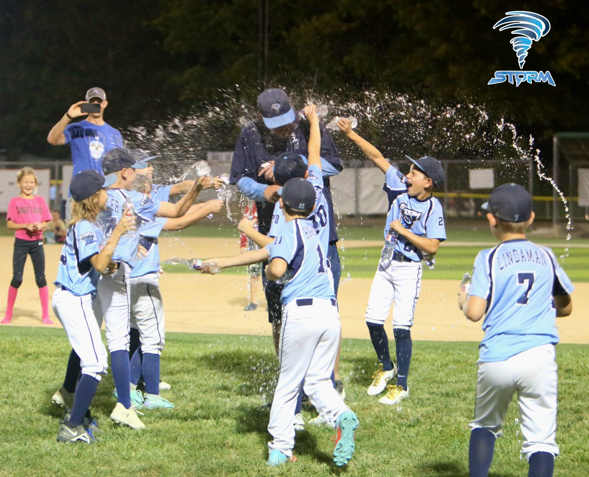 No Gatorade jug? No problem. The boys having some fun dousing coach Mike with water after winning the 3&amp;2 League Championship for the second time this year.

Great job Storm!