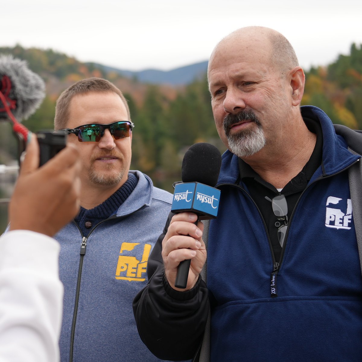 NYSPEF's tweet photo. Scenes  from today's #NoKings rally in Lake Placid with @nysut @SEIU1199_NE and more on the eve of PEF's 47th Convention. Video of President Spence's speech to come. https://t.co/PTRp6etMY0