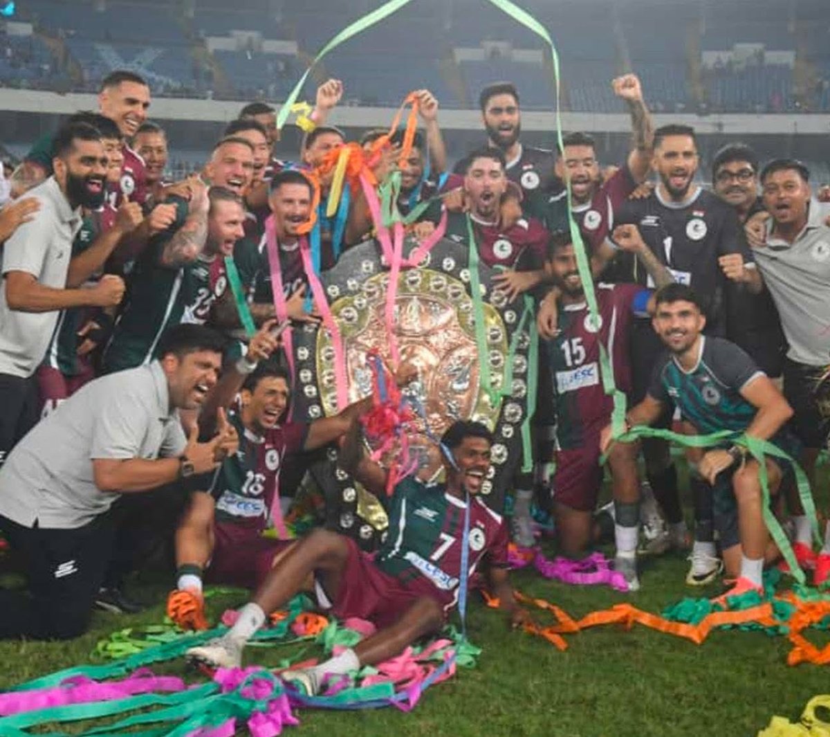 Nelson44274353's tweet photo. Kolkata is green and maroon once again. Happy to get one more trophy, this time IFA shield which was missing in my cabinet. Hoping for more in coming days. ❤️💚. Joy Mohunbagan. https://t.co/WTEP52svwh