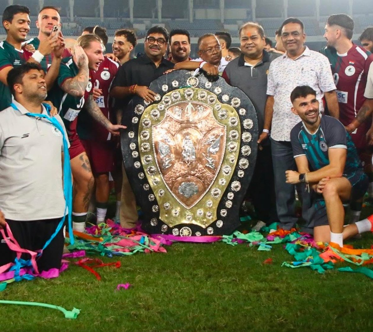 Nelson44274353's tweet photo. Kolkata is green and maroon once again. Happy to get one more trophy, this time IFA shield which was missing in my cabinet. Hoping for more in coming days. ❤️💚. Joy Mohunbagan. https://t.co/WTEP52svwh
