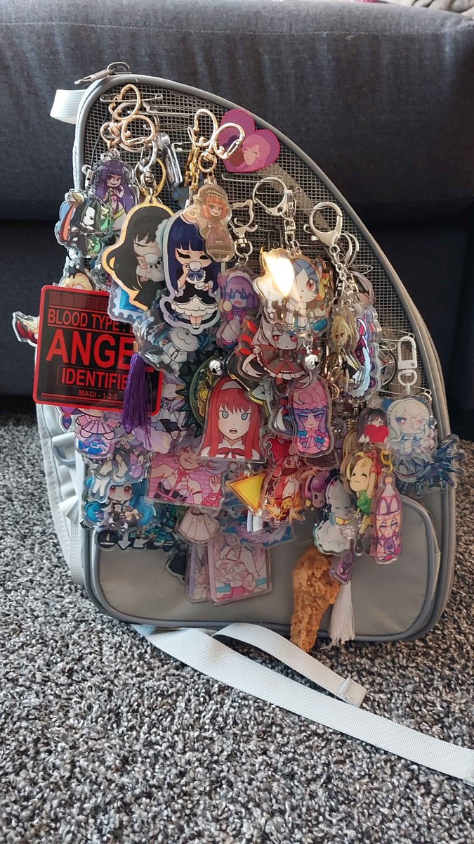 added a bunch of new charms to my bag for climax of night, not too trusting of the new safety pins but hopefully they at least stay on until i can get around to reorganizing all of them with better pins