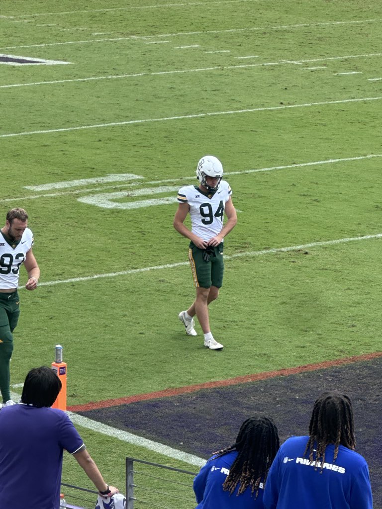 Palmer Williams comes out of the weather delay pounding an energy drink. Puts in on the pylon. Bro is going to the league.