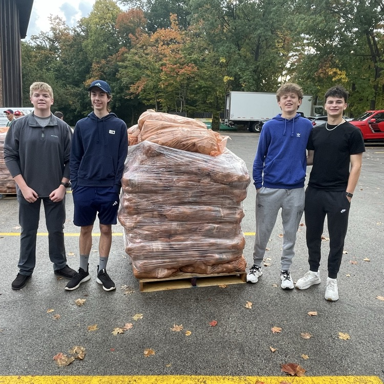 The Lincoln-Way East Boys Tennis team and computer club helped load 42,000 pounds of potatoes to food pantries in the Chicagoland area.