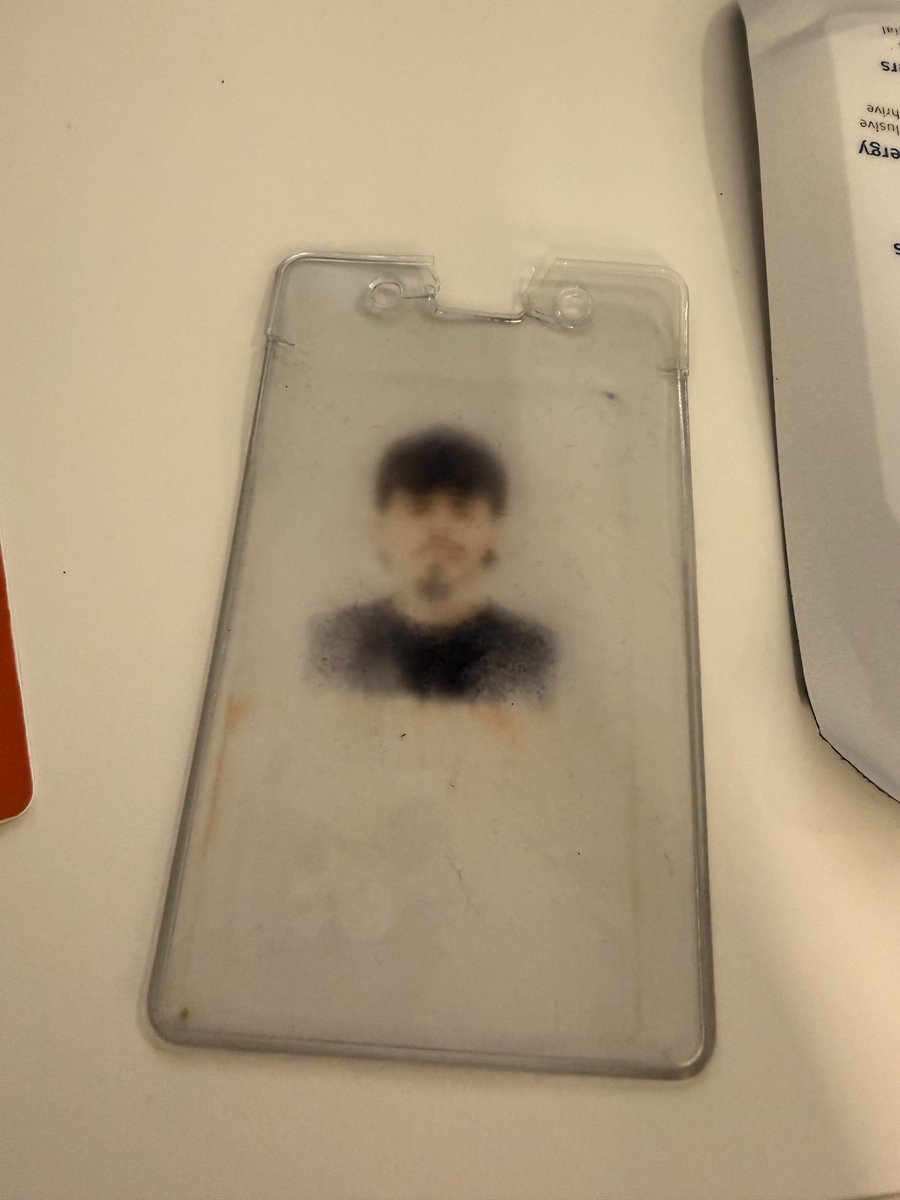 the ink on my work id rubbing off into the plastic kinda like when ppl go on primer impacto cs jesus appeared on their burnt tortilla