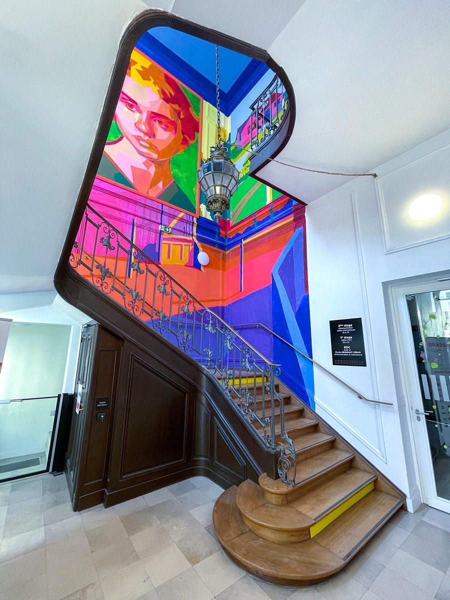 This anamorphic mural painted on the wall in a Paris Building.