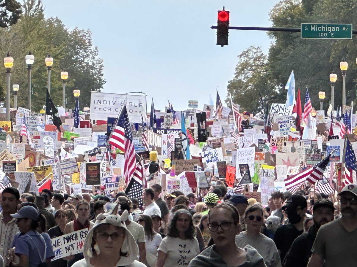 One of my favorite photos I took today. Right in the heart of Chicago on Michigan avenue. You can count a number of American flags, City of Chicago flags, pro democracy signs, and anti-fascist signs.

Meanwhile, you'll find zero flags to a politician, zero confederate flags, and