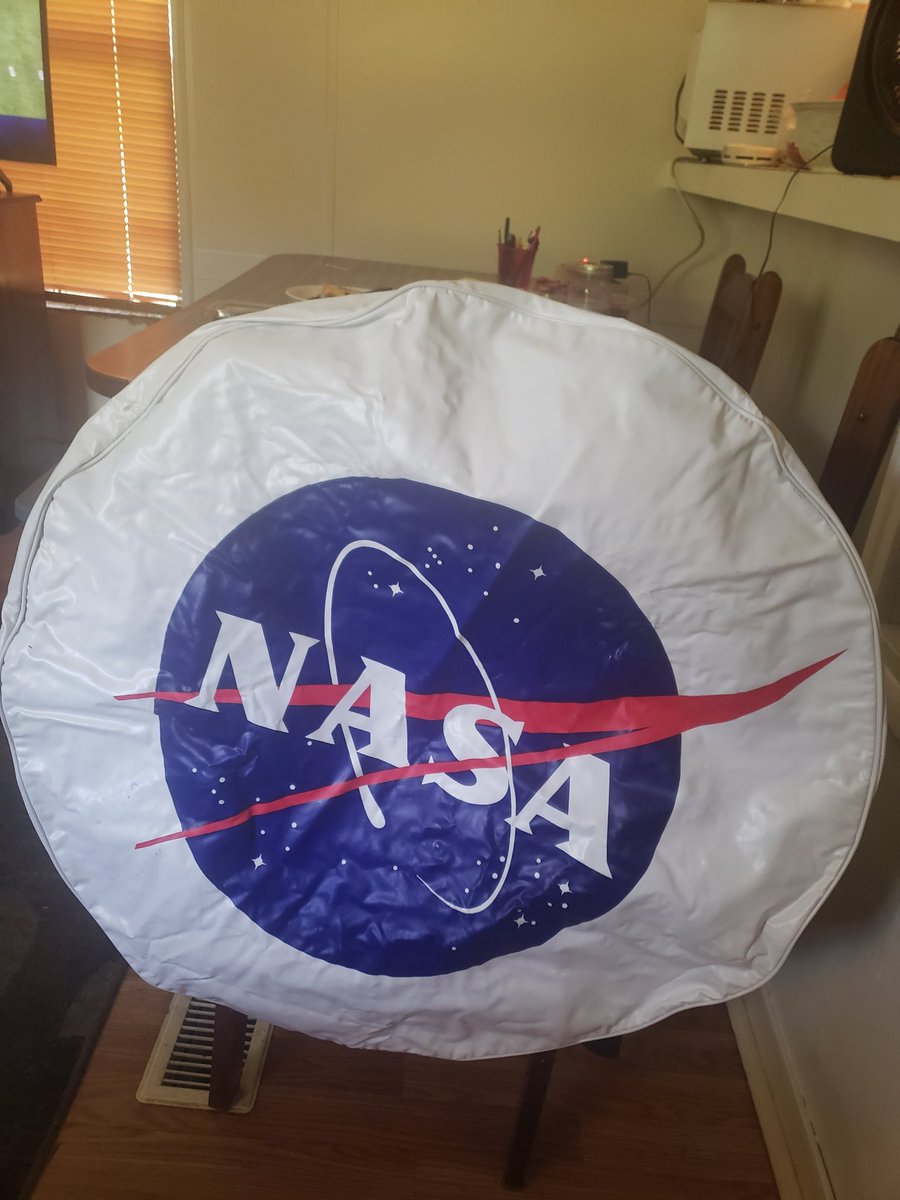 NASA leather wheel cover. Make me an offer. Collectors item.