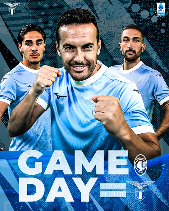 Three male soccer players in light blue S.S. Lazio jerseys with white accents stand side by side on a blue gradient background accented by white geometric patterns and the teams eagle emblem in the corners. The central player smiles confidently with fist raised, left player has arms crossed, right player points forward. Bold white text reads GAME DAY at bottom with 18:30 time and eagle icon.