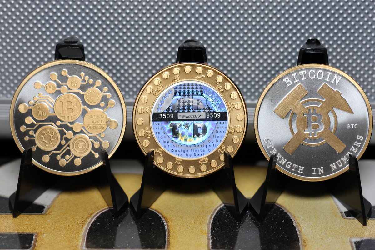 Eyellusive's tweet image. Two masterpieces from Finite by Design — 
• Bitcoin Gold Fine Silver Coin. 
• Bitcoin “Strength in Numbers” Cold Storage Coin. 

Both carrying the FirstBits hologram — where design meets decentralization. 🔥

 #FiniteByDesign #Bitcoin #PhysicalBitcoin #BTC