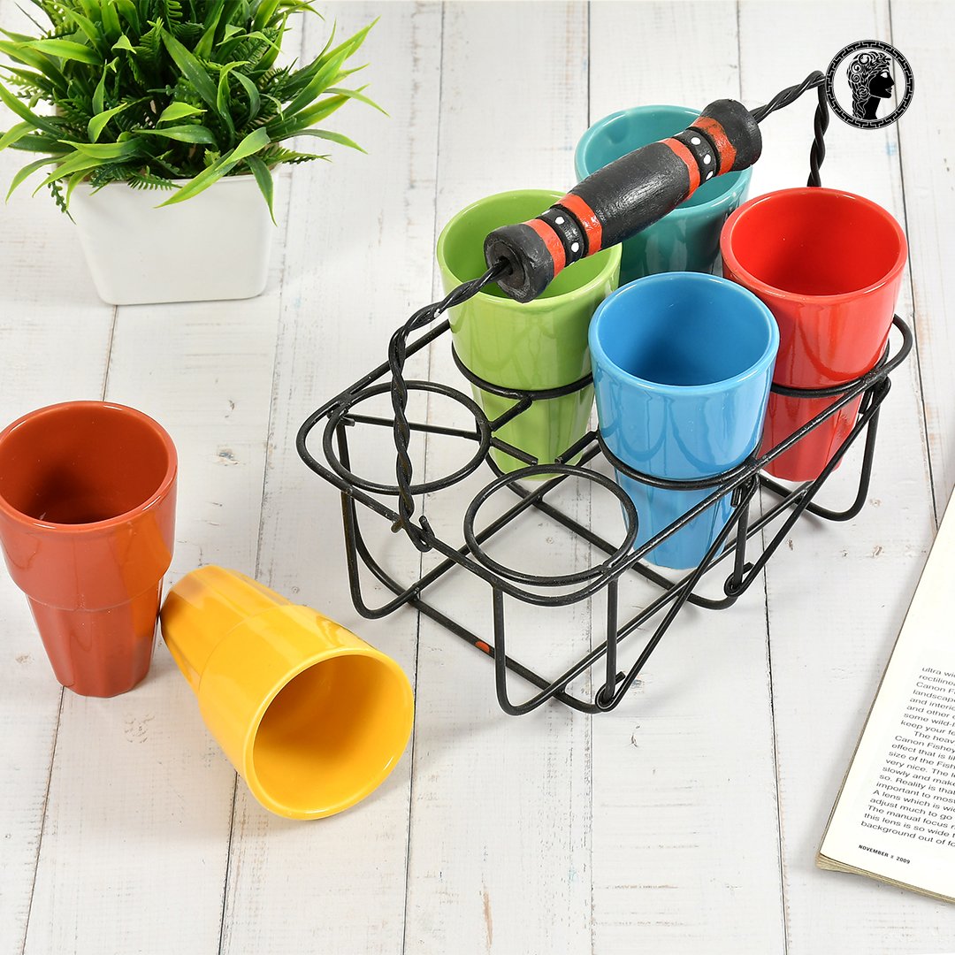 Cutting Chai, the Desi Way! 

Bring home the charm of roadside chai with our Handcrafted Cutting Chai Set 6 colorful ceramic glasses in a rustic iron stand.

Perfect for your evening chai, cozy gatherings, or that nostalgic tapri vibe now right at your table. 💛

🛒 Shop now!