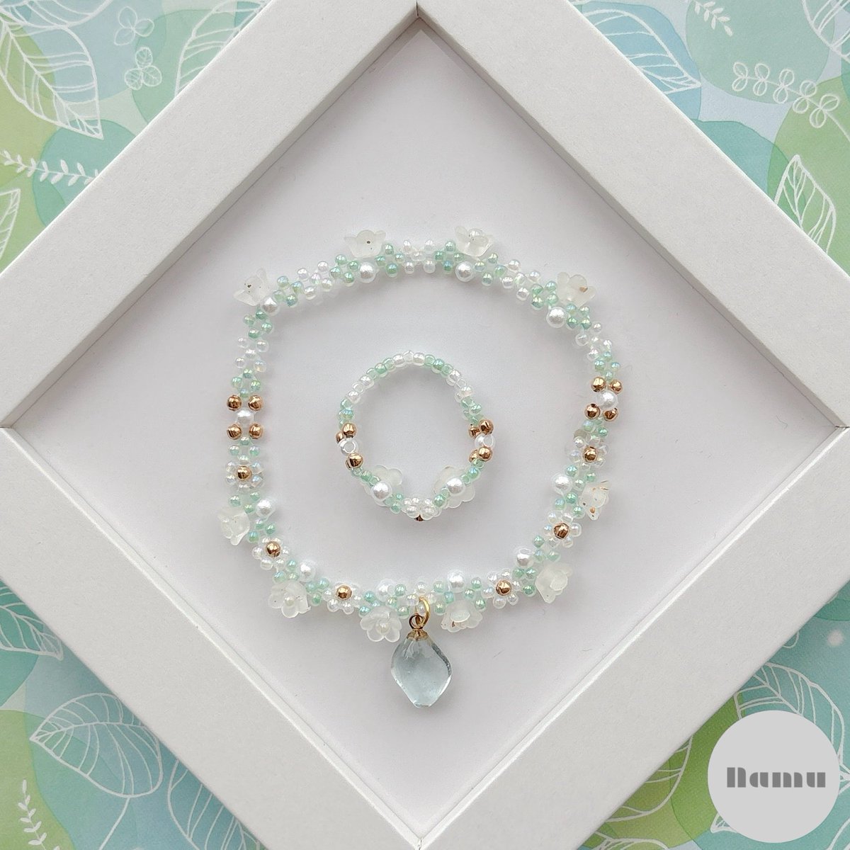 n_a_m_u_76's tweet image. lily of the valley☁️🌼

white🤍×green💚

#Namu #handmade #beads #seaglass #すずらん