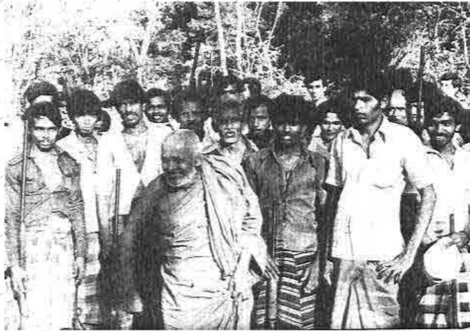 📸 A Buddhist monk leads a group of Sinhala settlers carrying guns marching to seize the lands of Tamil civilians

Since the 1950s, the Buddhist clergy has been at the forefront of Sinhala settler colonialism, guiding projects to ethnically cleanse Tamils from their homeland