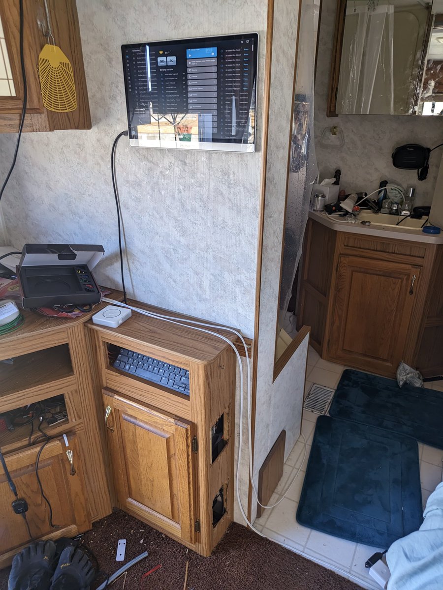 natrinicle's tweet image. Got my server moved into the lower cupboard with holes cut for 140mm fans and one of the two installed, and got the screen working with my HomeAssistant automatically logging in so I've got a dashboard showing status and allowing control!