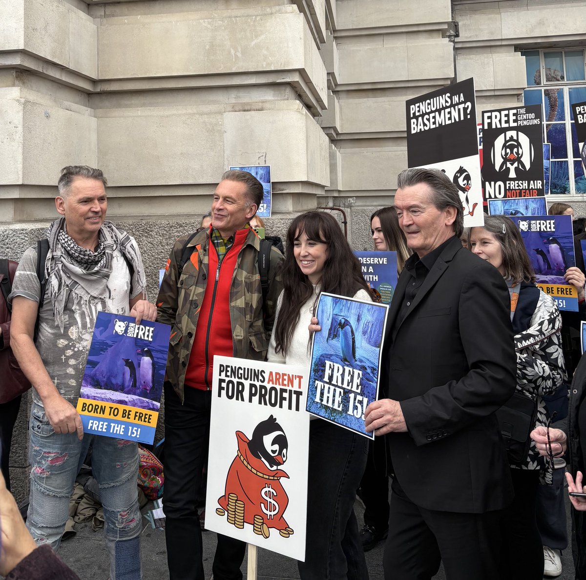 Raza_2013_'s tweet photo. At ‘FreeThe15’ penguin protest with @ChrisGPackham, @MeganMcCubbin, @DaleVince, @Feargal_Sharkey, Freedom for Animals and others. 

The 15 gentoo penguins being held “captive” at the London Sea Life Aquarium deserve freedom - RETWEET if you agree! 

Full coverage coming shortly! https://t.co/9e1j9tc9ry