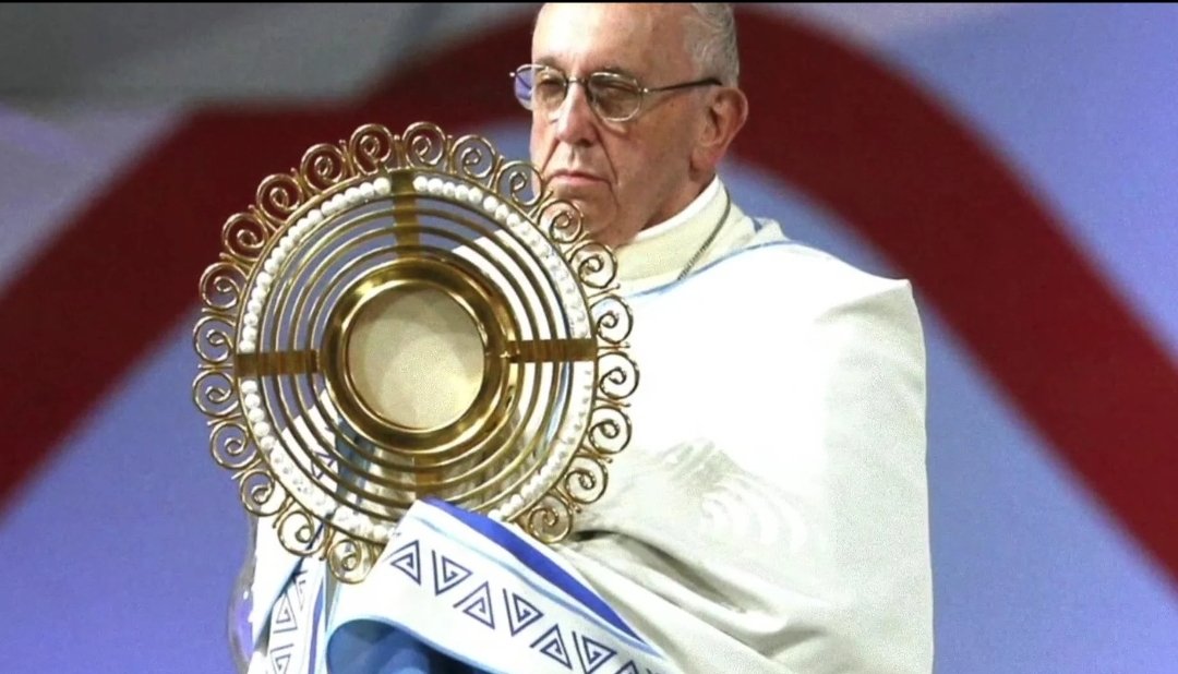 Pope Francis on international youth day, is that the (BLogo) or am i crazy?

Two reported pedophile symbols and wearing it on international youth day. yeah idk.