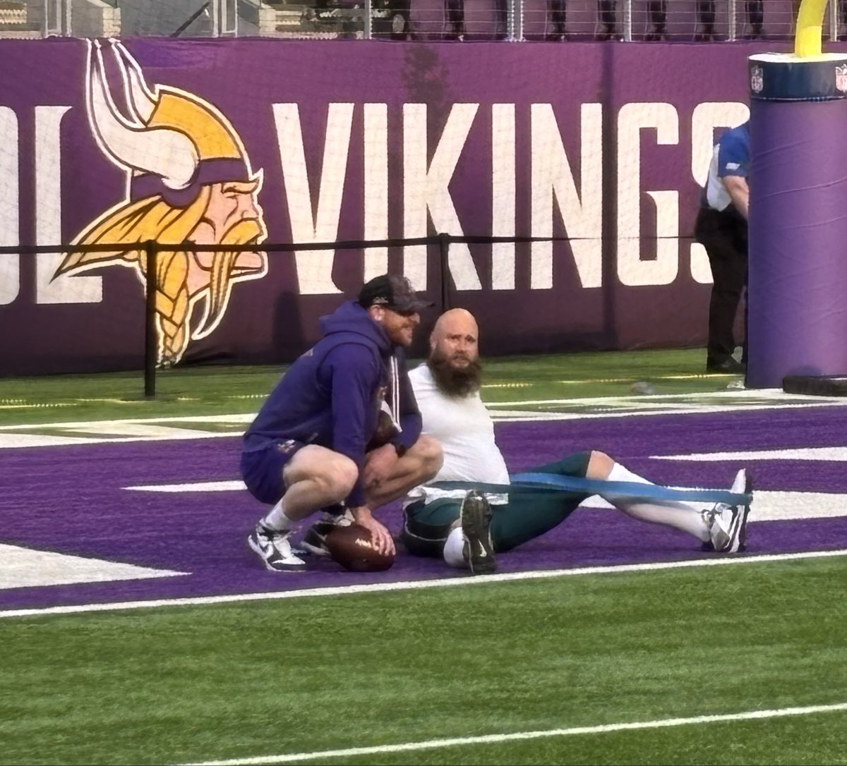 Lane Johnson and Carson Wentz catching up before the game and having a few laughs