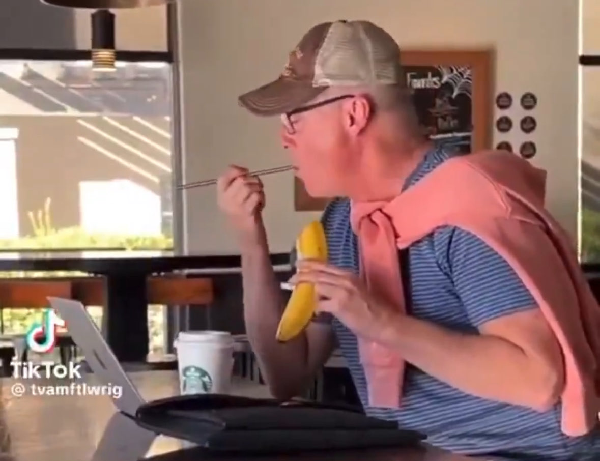The person who posts from the “Gunther Eagleman” account is named David Freeman, here is a picture of him in real life eating a banana with a spoon