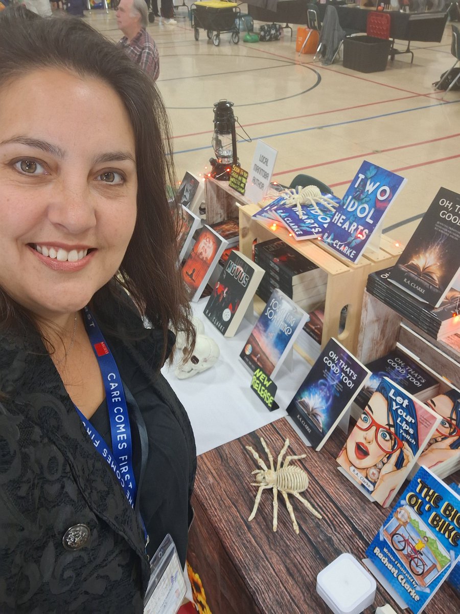 raclarkewrites's tweet image. Here at this spooky market today and loving the vibe. Definitely stop by for some Halloween stuff and a book, too! Why not? ;) #booksbooksbooks #spookyvibes #halloween2025 #fiction
