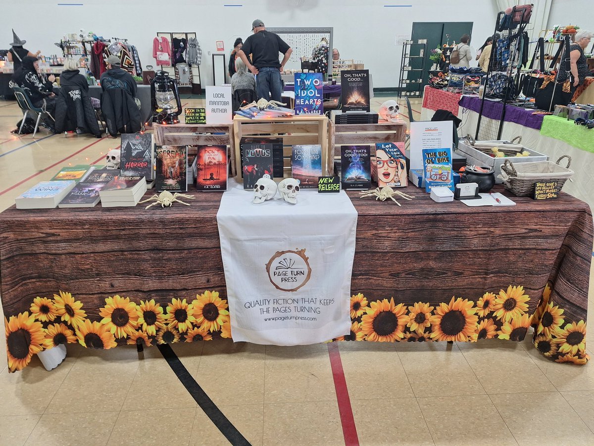 raclarkewrites's tweet image. Here at this spooky market today and loving the vibe. Definitely stop by for some Halloween stuff and a book, too! Why not? ;) #booksbooksbooks #spookyvibes #halloween2025 #fiction