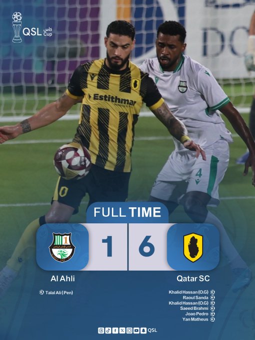 Two soccer players in action on the field one in a yellow and black striped jersey with black shorts reaching for the ball and the other in a green jersey with white shorts defending both with focused expressions and athletic builds the background shows a stadium goalpost and partial scoreboard text overlay displays FULL TIME with Al Ahli 1 - 6 Qatar SC and lists goal scorers Taieb Al Ani and Hassan Al Khalifi for Al Ahli and Khaled Al Sayed Joao Pedro and Yan Matheus for Qatar SC.