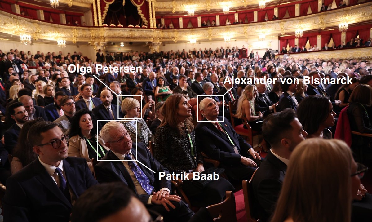 Olga Petersen, a former AfD MP from Hamburg, her friend and Putin admirer Alexander von Bismarck, and another of Russia’s admirers in Germany, Patrick Baab, can be seen in this photo from RT’s 20th anniversary celebration on October 17 in Moscow, published by the Kremlin.