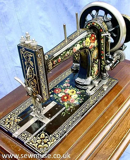 xmuse_'s tweet image. A Bradbury High Arm Family sewing machine with beautiful floral details, likely dating to around 1902.