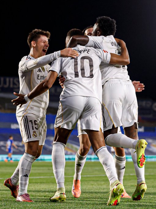 First image shows four Real Madrid players in white jerseys celebrating on the green field at night under stadium lights, with one player wearing number 10 jersey hugging another, all wearing yellow socks and appearing joyful after a goal. Second image depicts a referee in red uniform holding up a red card on the soccer field, facing a Getafe player in blue jersey with number 12, while another Getafe player in white jersey number 14 claps nearby, surrounded by stadium seating.