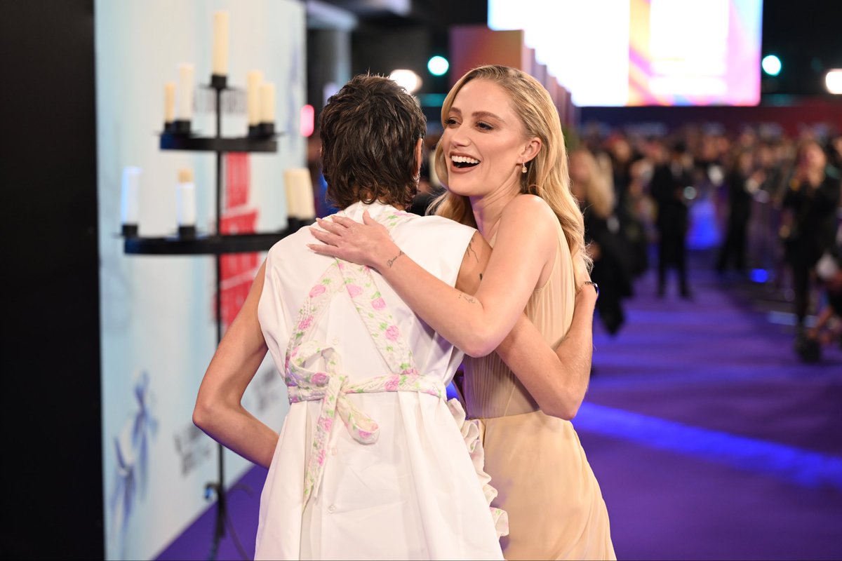 BFI's tweet image. The world of 100 Nights of Hero came alive at the 69th BFI London Film Festival Closing Night Gala. ✨

We were joined on the carpet for the final time this year by Julia Jackman, Amir El-Masry, Felicity Jones, Emma Corrin, Maika Monroe and Richard E. Grant​. 

#LFF