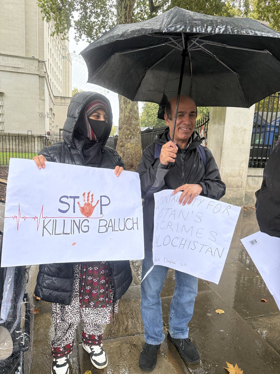BalochV4Justice's tweet photo. Members of the Baloch diaspora in the United Kingdom staged a protest outside 10 Downing Street in London against what they described as a “brutal military operation” in the Zehri area of Balochistan.

The demonstrators carried banners and chanted slogans accusing Pakistani security forces of human rights violations. They called on the British government to “break its silence” and hold Pakistan accountable for what they termed ongoing abuses in Balochistan.

According to the organizers, ordinary residents of Zehri are facing a “siege-like situation,” with intensified military operations in the area. They alleged that women and children are being killed in bombings, roads have been blocked, and curfews imposed—leaving the local population in a state of extreme distress. They described the situation as “a systematic genocide” and urged international human rights organizations to send fact-finding missions to the region.

#ZehriUnderSiege
#StopBalochGenocide