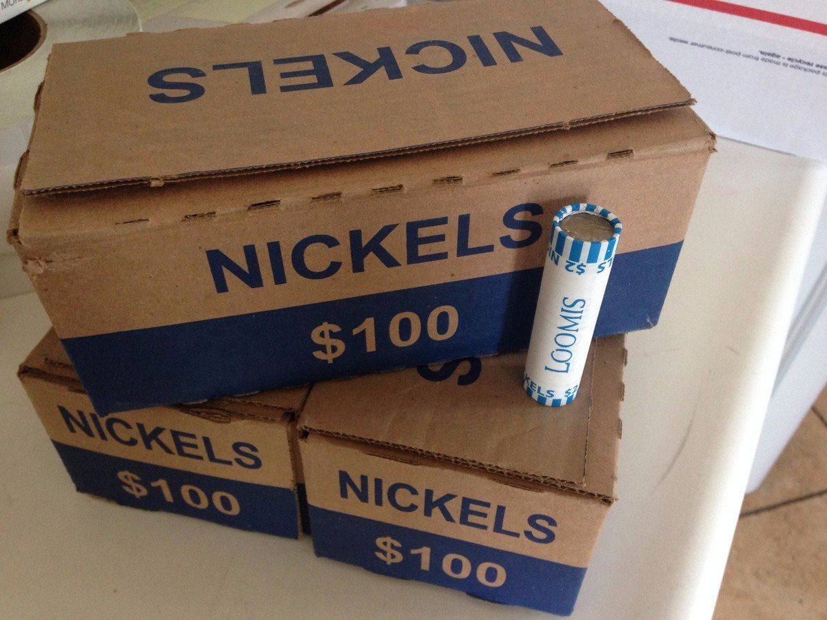 I Bought $250,000 Worth of Physical Nickels

No, that’s not a typo.

That’s 5 million coins. 55,000 pounds of American metal stacked in boxes from a local bank vault — an asset the government literally can’t print anymore.

Most people would call it insane.
But let me explain the