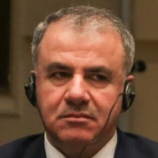 trbrtc's tweet photo. @Basel_Saneeb Hi Basel, thanks so much for your reply. I have your book here on the Syrian intelligence agencies, thank you for sharing that with the world. We're using this photo of Kamal Hassan, we're confident it's the same person as in the photo you shared. https://t.co/ujFXla6jL7 https://t.co/L78Pnllcsb