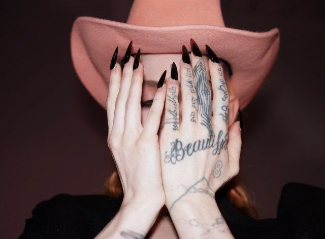 c' hand tattoo