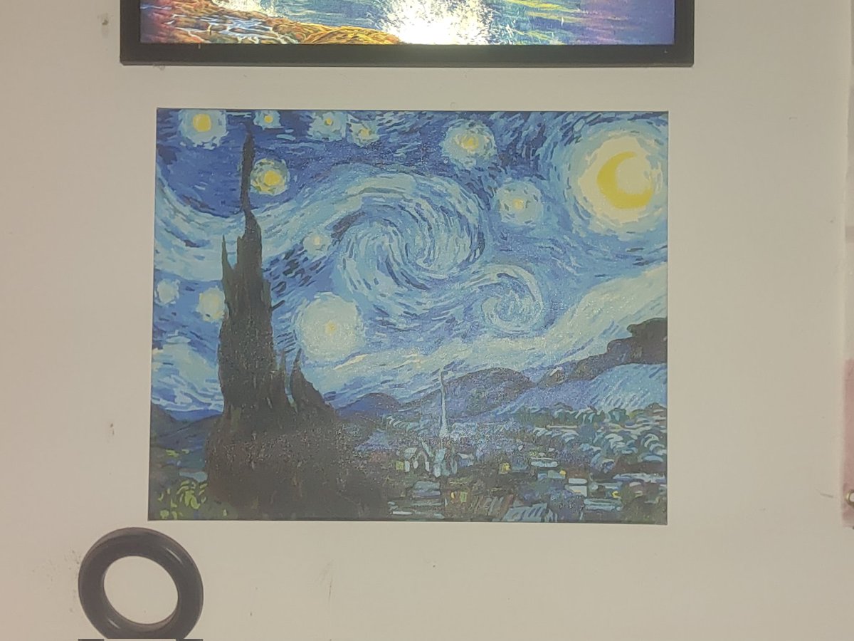 He finally got the painting I made him up on the wall♥