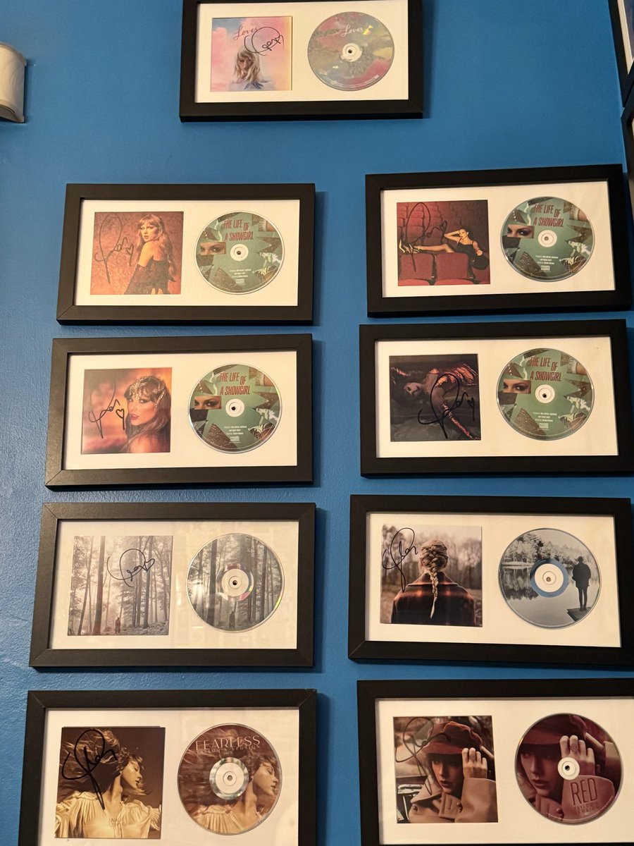 SwiftHernandez's tweet photo. Signed CD and vinyl  wall are all complete ! 
❤️‍🔥🧡🩵
#TSTheLifeofaShowgirl #TaylorSwift #TaylorNation #Swiftie #SwiftDay
#TSTheErasTour @taylorswift13 @taylornation13 https://t.co/S7ZyRD8fxk