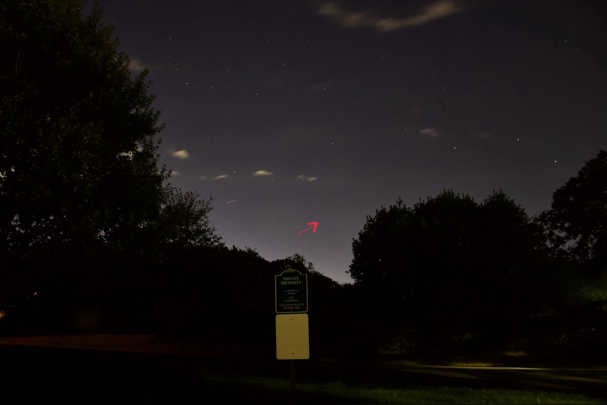 CosmosconBlog's tweet image. Finally tried to get a shot of comet C/2025 A6 (Lemmon) but as I feared, I was staring into a massive sky glow from the city.  
But the arrow shows where it is and you can see the tiny, fuzzy thing if you zoom in. 
This is just quick editing with Apple photo editor.  
Canon…