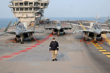 TimesNow's tweet image. PM @narendramodi tweets: "At the majestic flightdeck of INS Vikrant, with the MiG-29 fighters."

#PMModi #Viral #INSVikrant