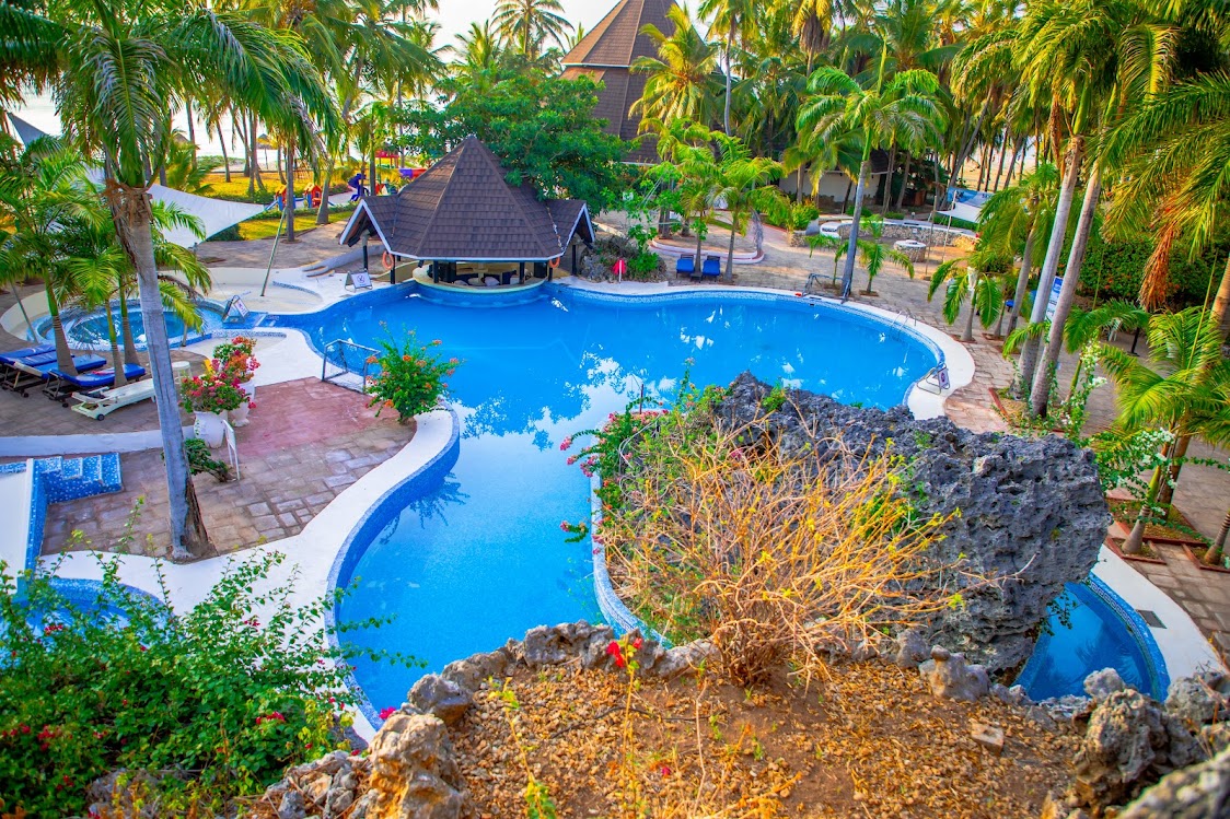 diani_reef's tweet image. Paradise found!  Whether you’re floating away in our lagoon-style pool or soaking in the tropical breeze, every moment at Diani Reef Beach Resort is pure bliss.
#dianibeach #LuxuryEscape #tropicalvibes #CoastalGetaway #PoolsideParadise #VisitKenya