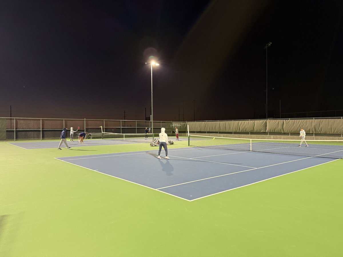Warming up for State Tennis under the lights with Sam,  JT, Emmitt, Zach,  Jackson, Jaxson, and Maxx!  Does not get any better than this!